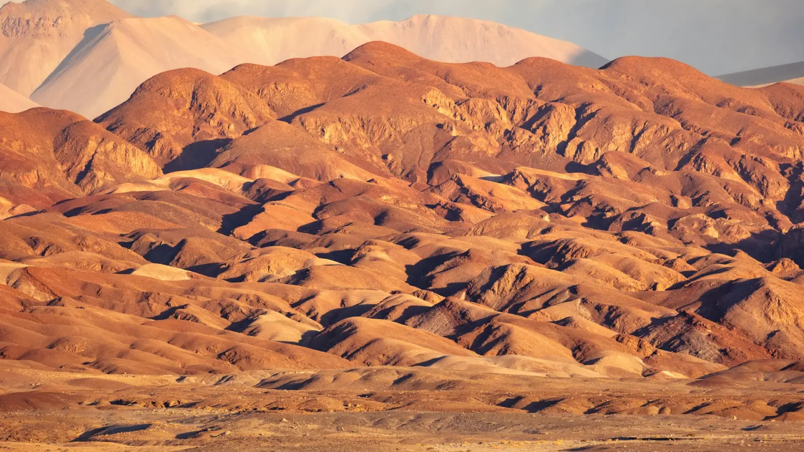 Atacama desert landscape with mountains at sunset